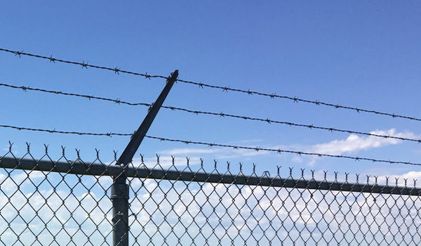 Chain Link Fence with Barbed Wire
